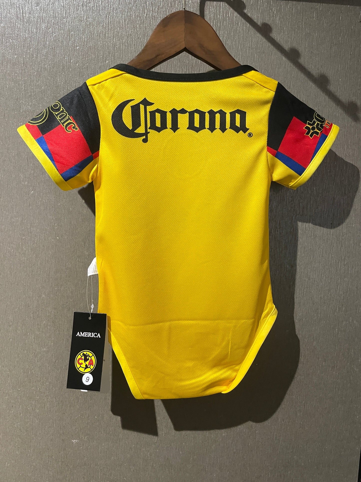 Body Bebê Infantil America do Mexico Home 25/26 - Amarelo