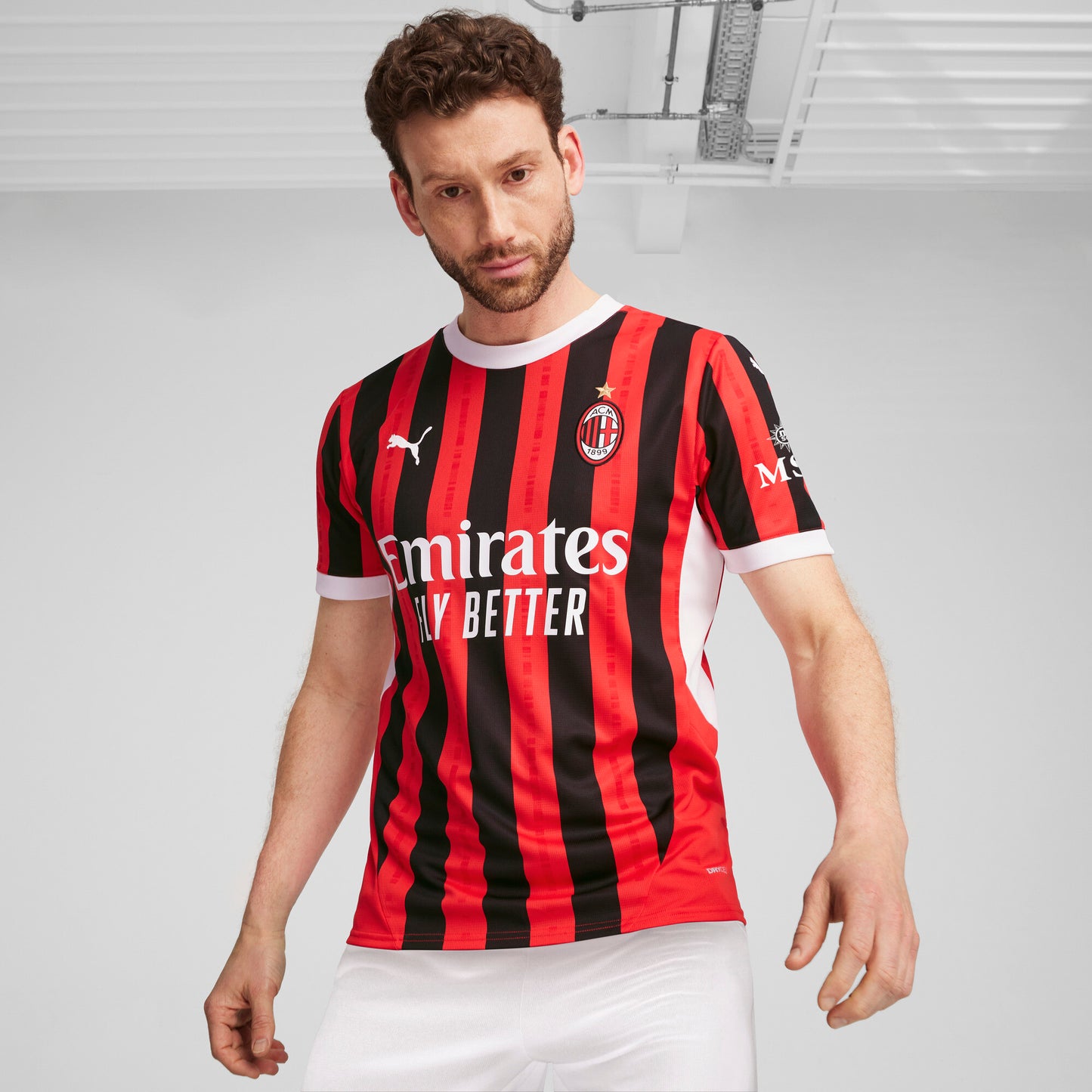 Milan Home 24/25 Torcedor Puma - Vermelho e Preto