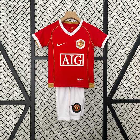 Kit infantil Manchester United Retrô Home 2006 . - Vermelho